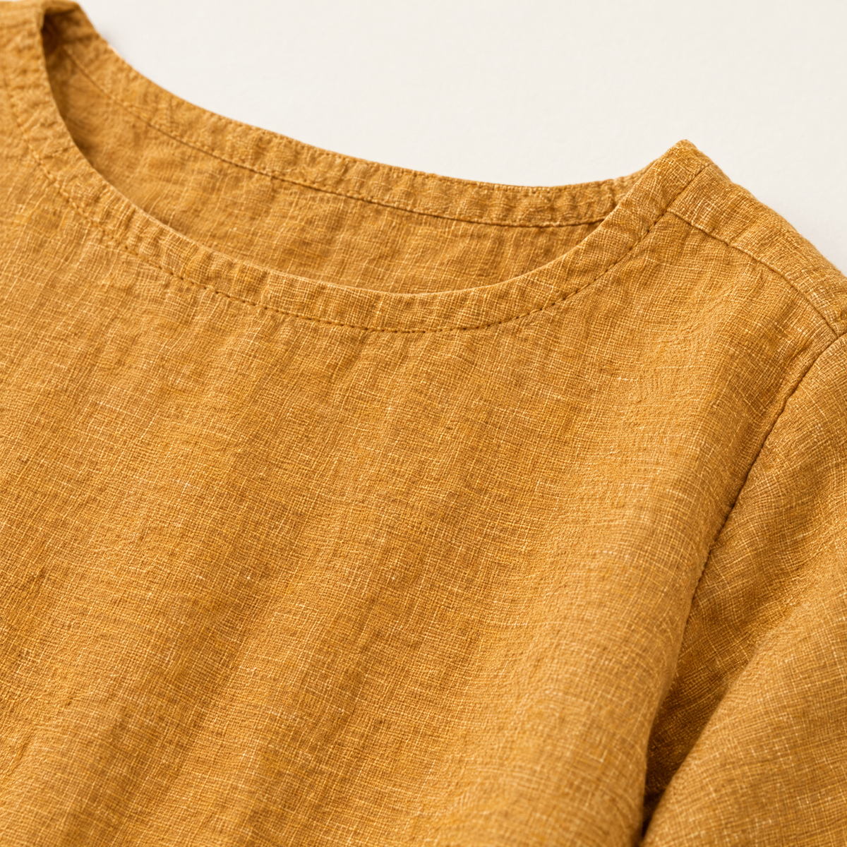 Honey Gold Long Sleeve Linen Top - linen fabric and detail close-up